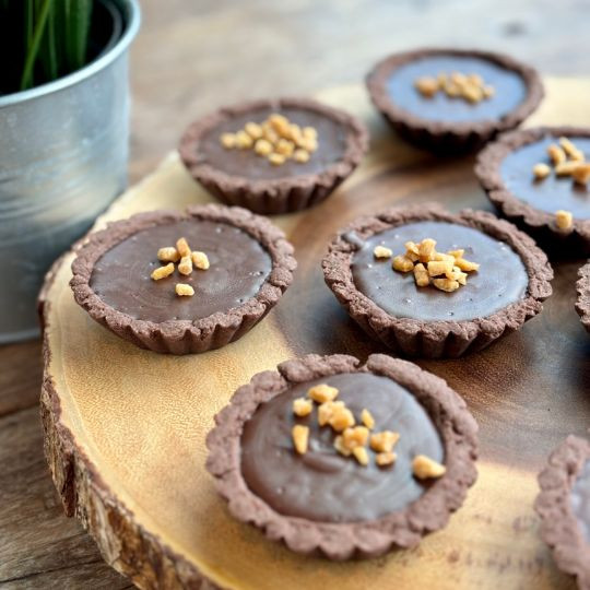 Chocolate tartlet, dark chocolate ganache, maple sugar |