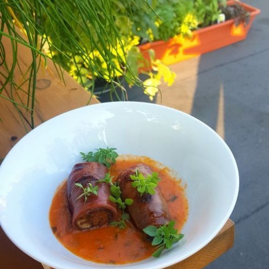 Prosciutto roll, dates, merguez sausages and diced tomatoes with basil