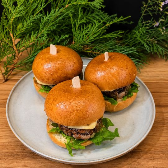 Mini duck confit burgers with mushrooms, Migneron de Charlevoix and three-mustard maple sauce
