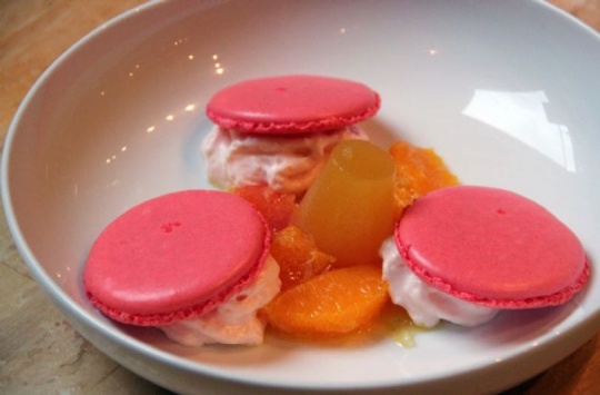 Fresh fruits macaroons, citrus fruits zests, orange and mango jelly